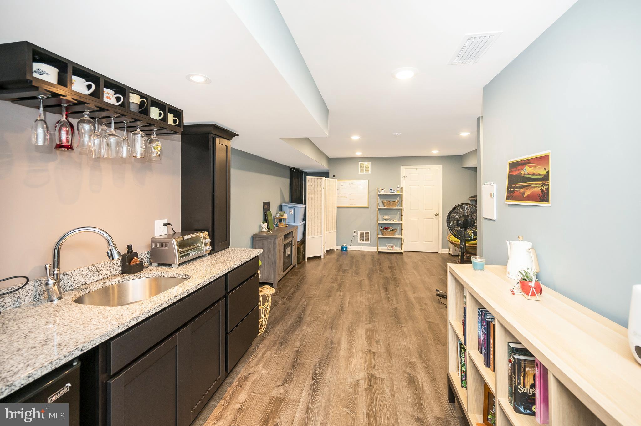 12062 Rundle Crossing King George, VA 22485 - Photo 38 of 67 a kitchen with sink a faucet and chairs