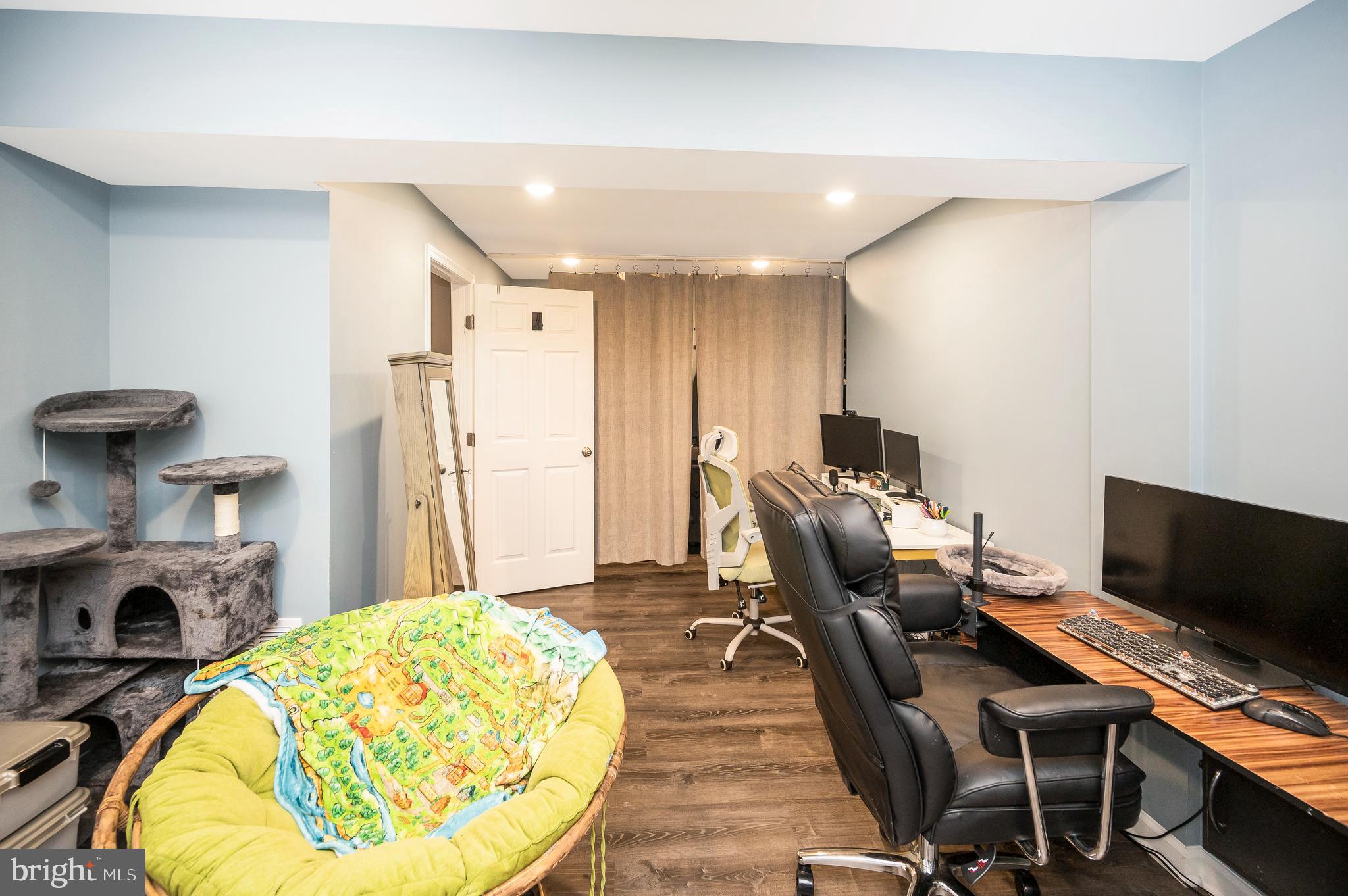 12062 Rundle Crossing King George, VA 22485 - Photo 40 of 67 a view of a workspace with furniture and a fireplace