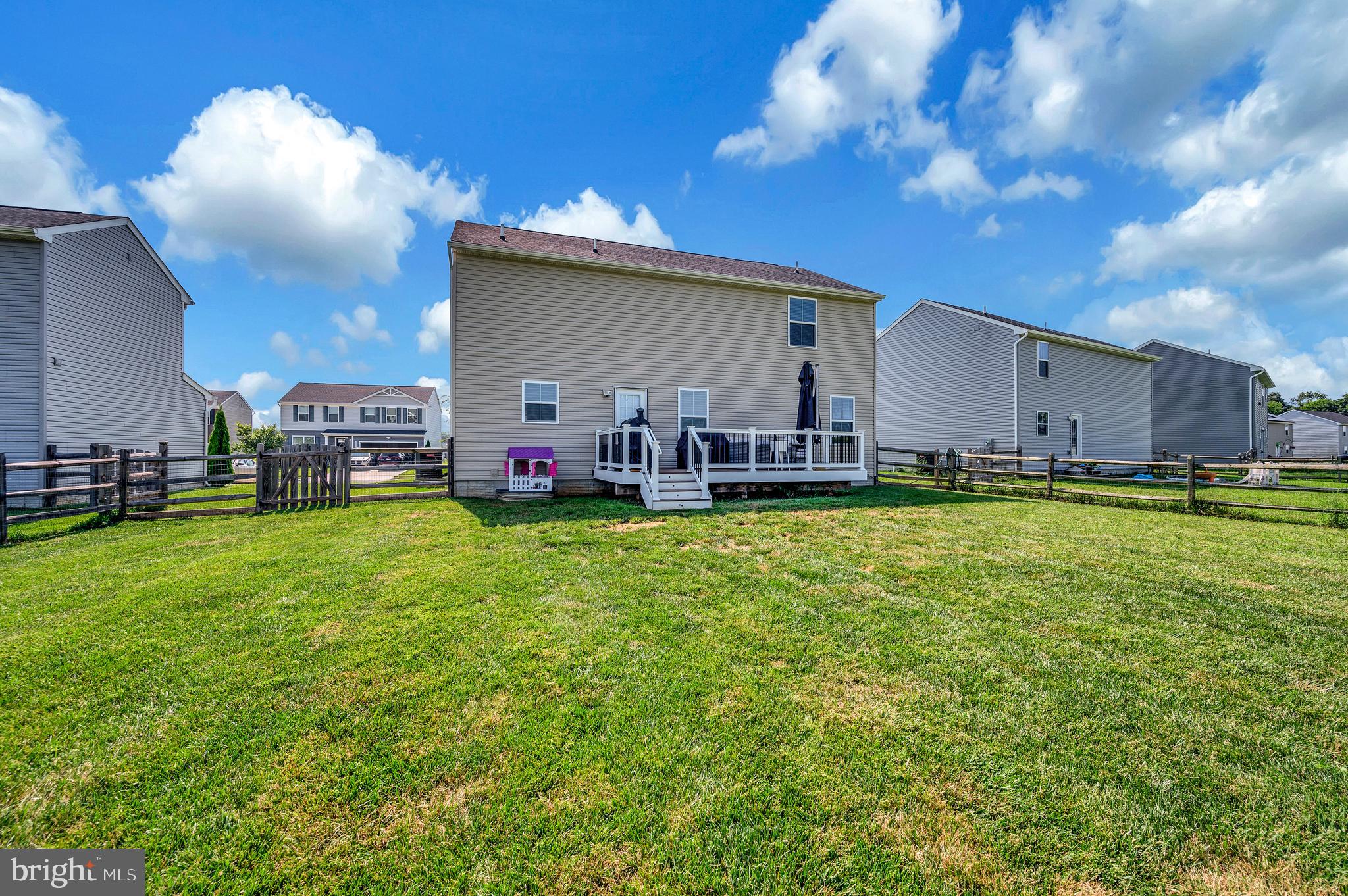 12062 Rundle Crossing King George, VA 22485 - Photo 45 of 67 a view of backyard with swimming pool and seating