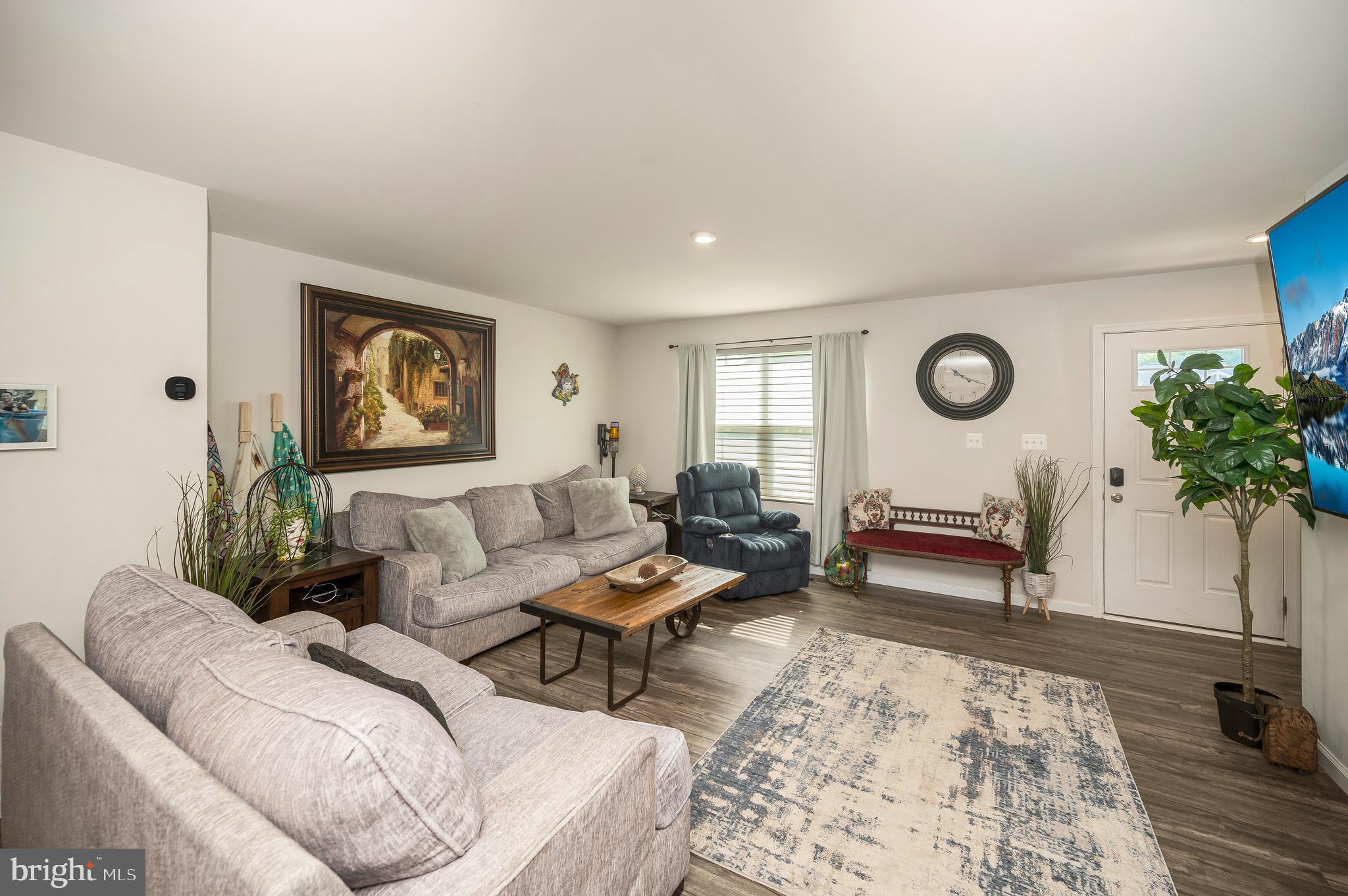 12062 Rundle Crossing King George, VA 22485 - Photo 6 of 67 a living room with furniture and a potted plant