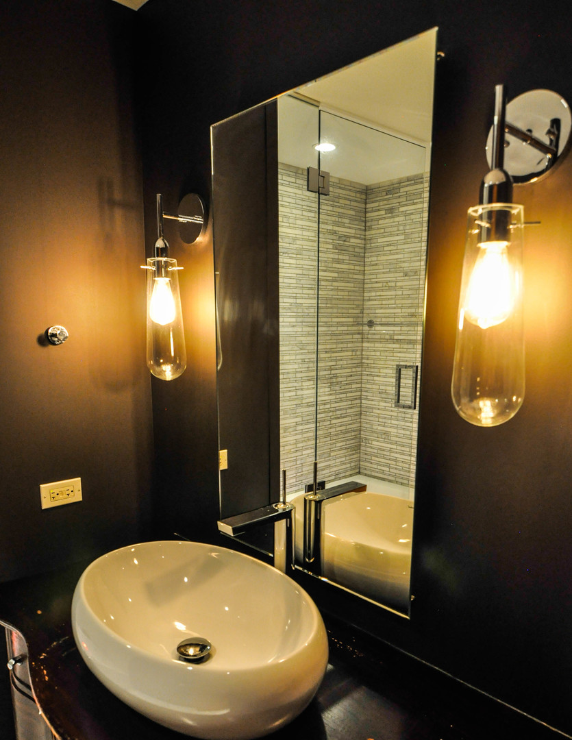 8 East Randolph Street, Unit 2807 Chicago, IL 60601 - Photo 14 of 37 a bathroom with a mirror