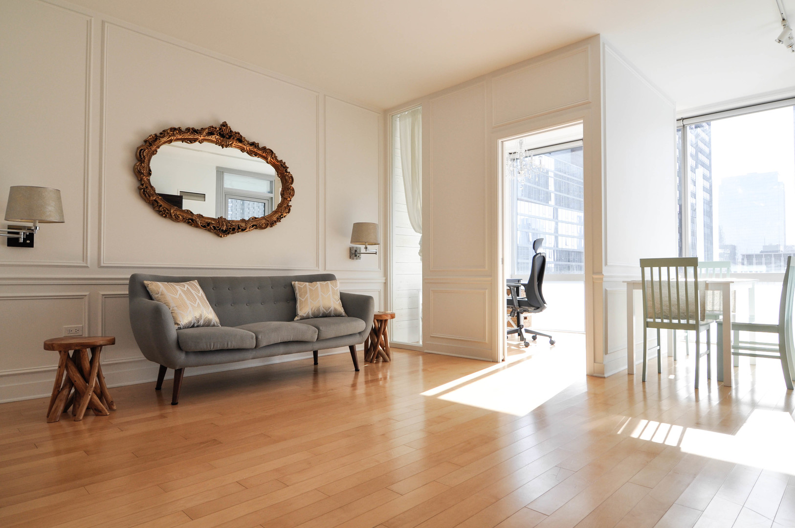 8 East Randolph Street, Unit 2807 Chicago, IL 60601 - Photo 4 of 37 a living room with furniture and a mirror