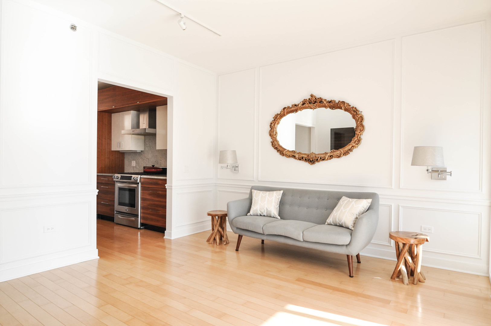 8 East Randolph Street, Unit 2807 Chicago, IL 60601 - Photo 5 of 37 a living room with furniture and a wooden floor