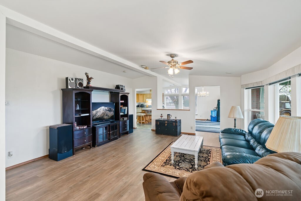 163106 West North River Road Prosser, WA 99350 - Photo 6 of 31 a living room with furniture and a flat screen tv