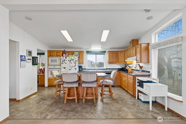 a view of a dining room with furniture