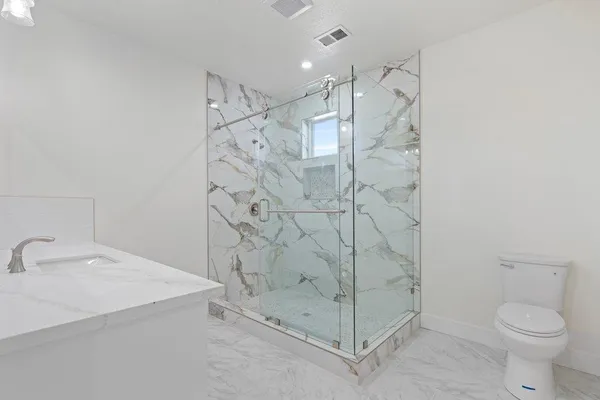 a view of storage and utility room with a sink