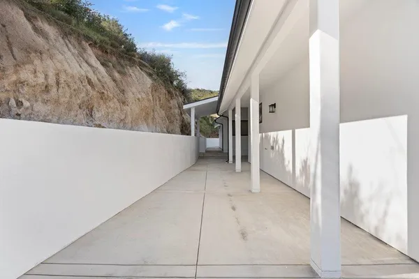 a view of a hallway view with staircase