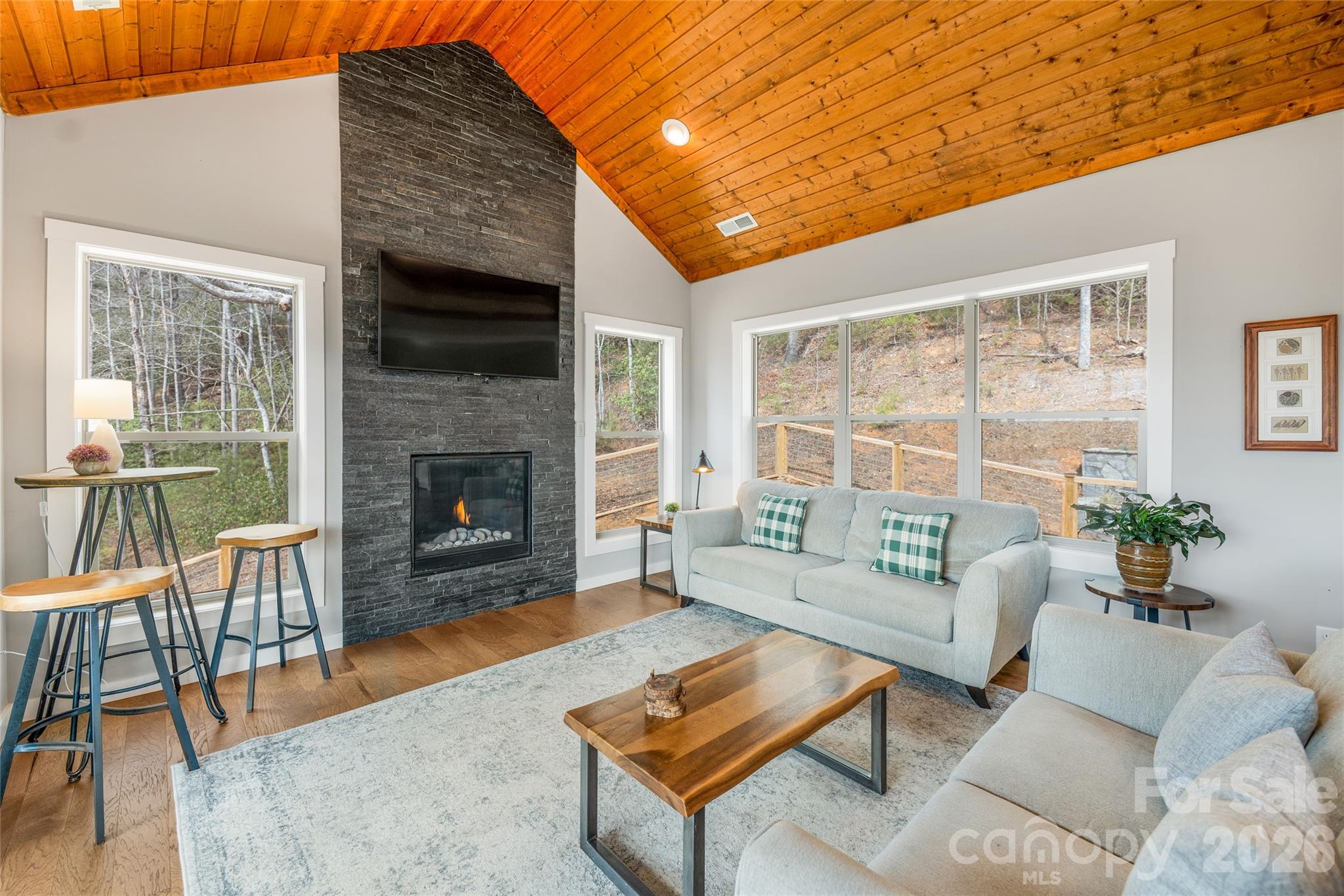 54 Weldon Way Fairview, NC 28730 - Photo 13 of 47 a living room with furniture and a fireplace