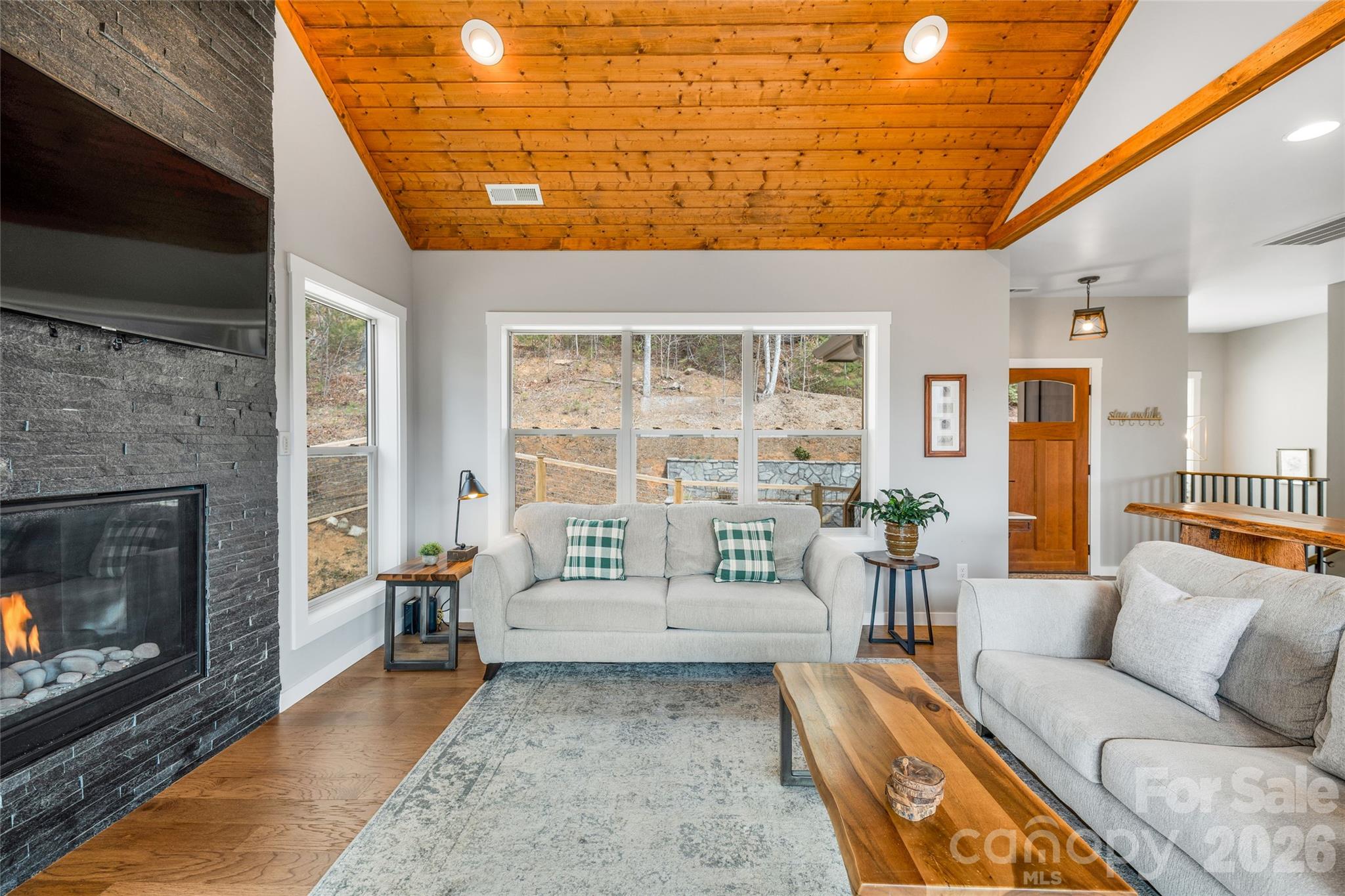 54 Weldon Way Fairview, NC 28730 - Photo 14 of 47 a living room with furniture and a fireplace