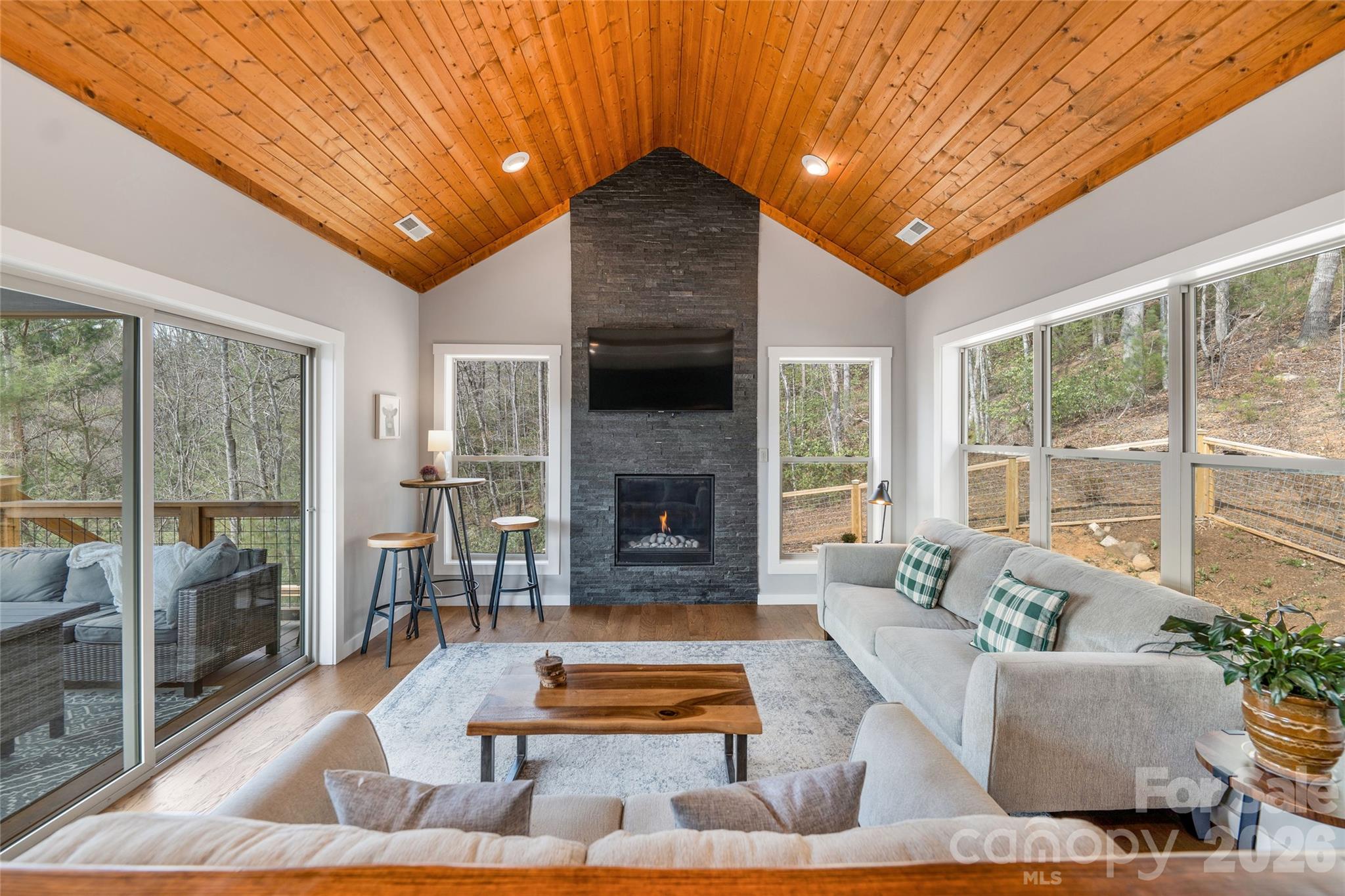 54 Weldon Way Fairview, NC 28730 - Photo 16 of 47 a living room with furniture and a fireplace