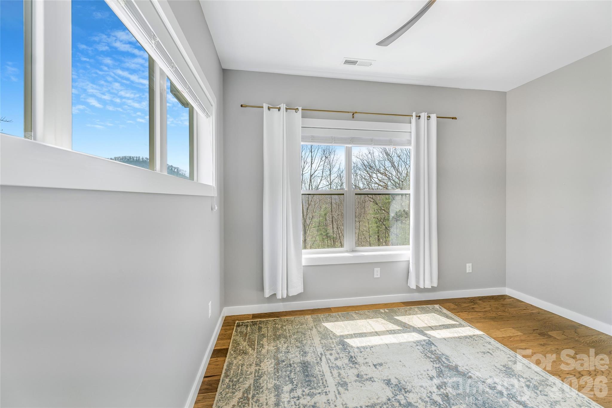 54 Weldon Way Fairview, NC 28730 - Photo 23 of 47 a view of an empty room and window