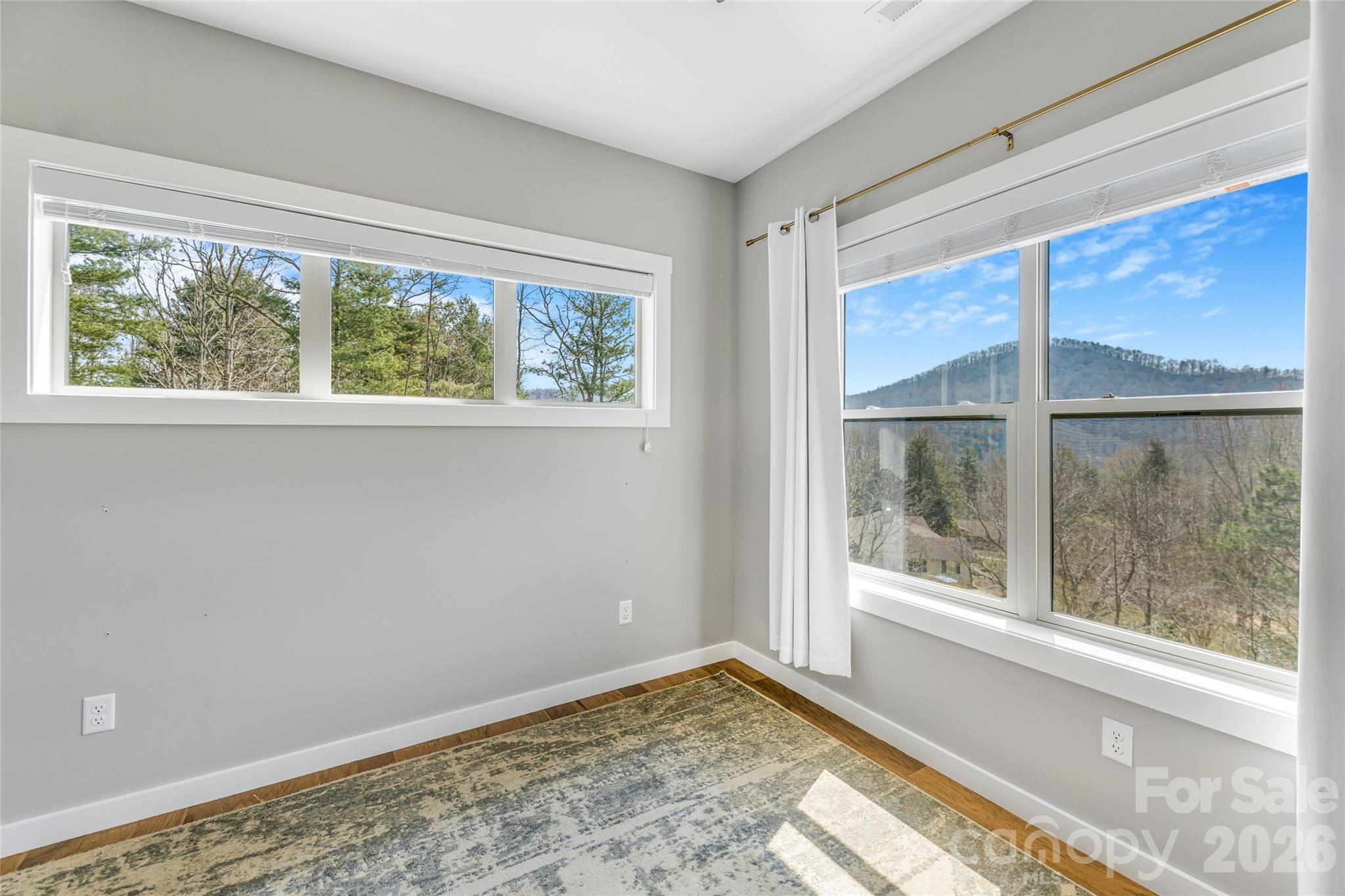 54 Weldon Way Fairview, NC 28730 - Photo 24 of 47 a view of an empty room with a window