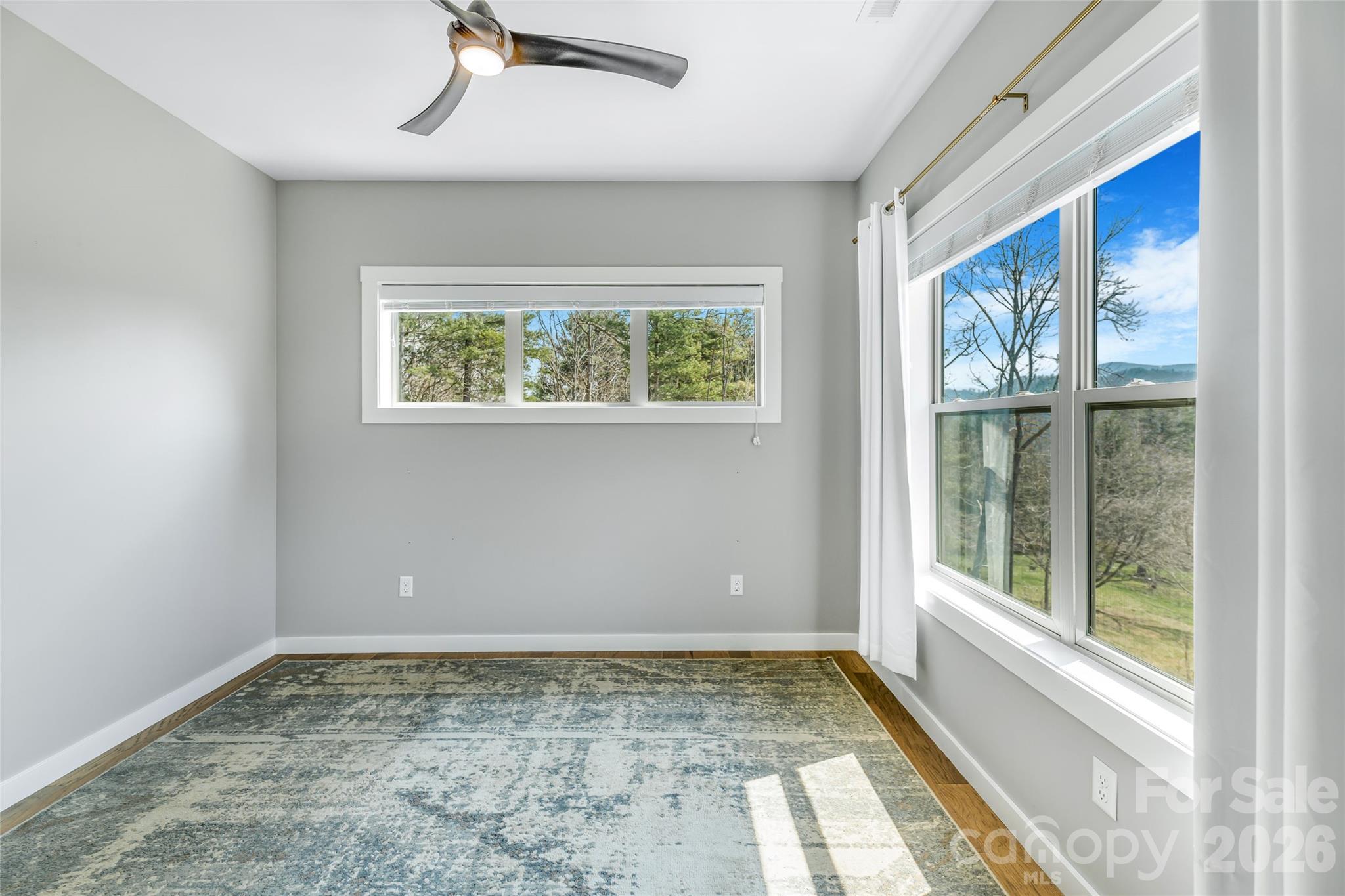 54 Weldon Way Fairview, NC 28730 - Photo 25 of 47 a view of an empty room and window