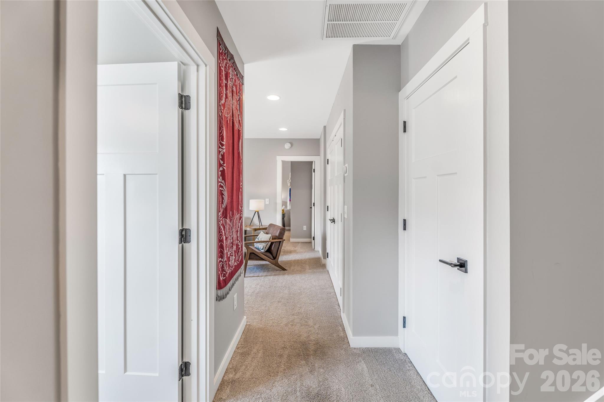 54 Weldon Way Fairview, NC 28730 - Photo 33 of 47 a view of a hallway with wooden shelves