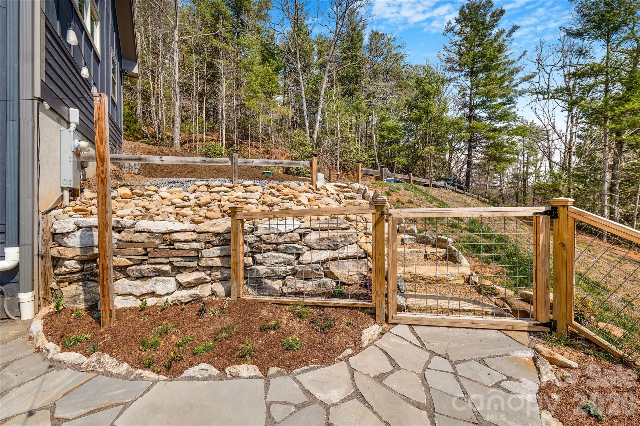 54 Weldon Way Fairview, NC 28730 - Photo 39 of 47 a view of a pathway along the building