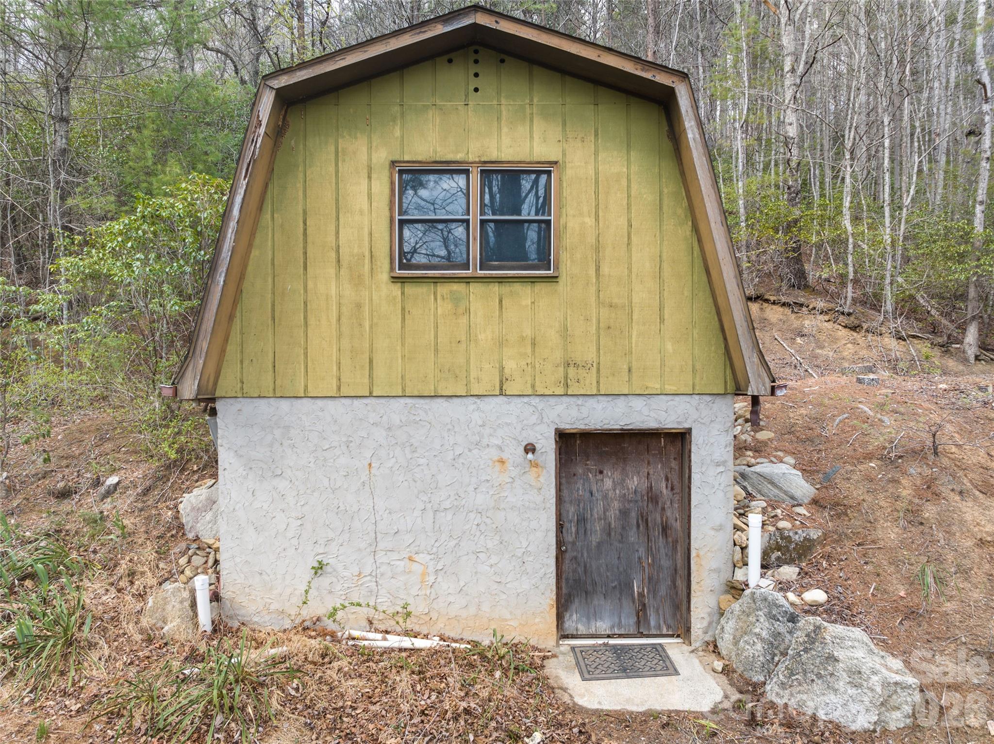 54 Weldon Way Fairview, NC 28730 - Photo 41 of 47 a front view of a house with a yard