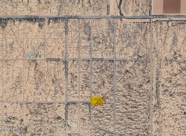 a view of an ocean and a mountain