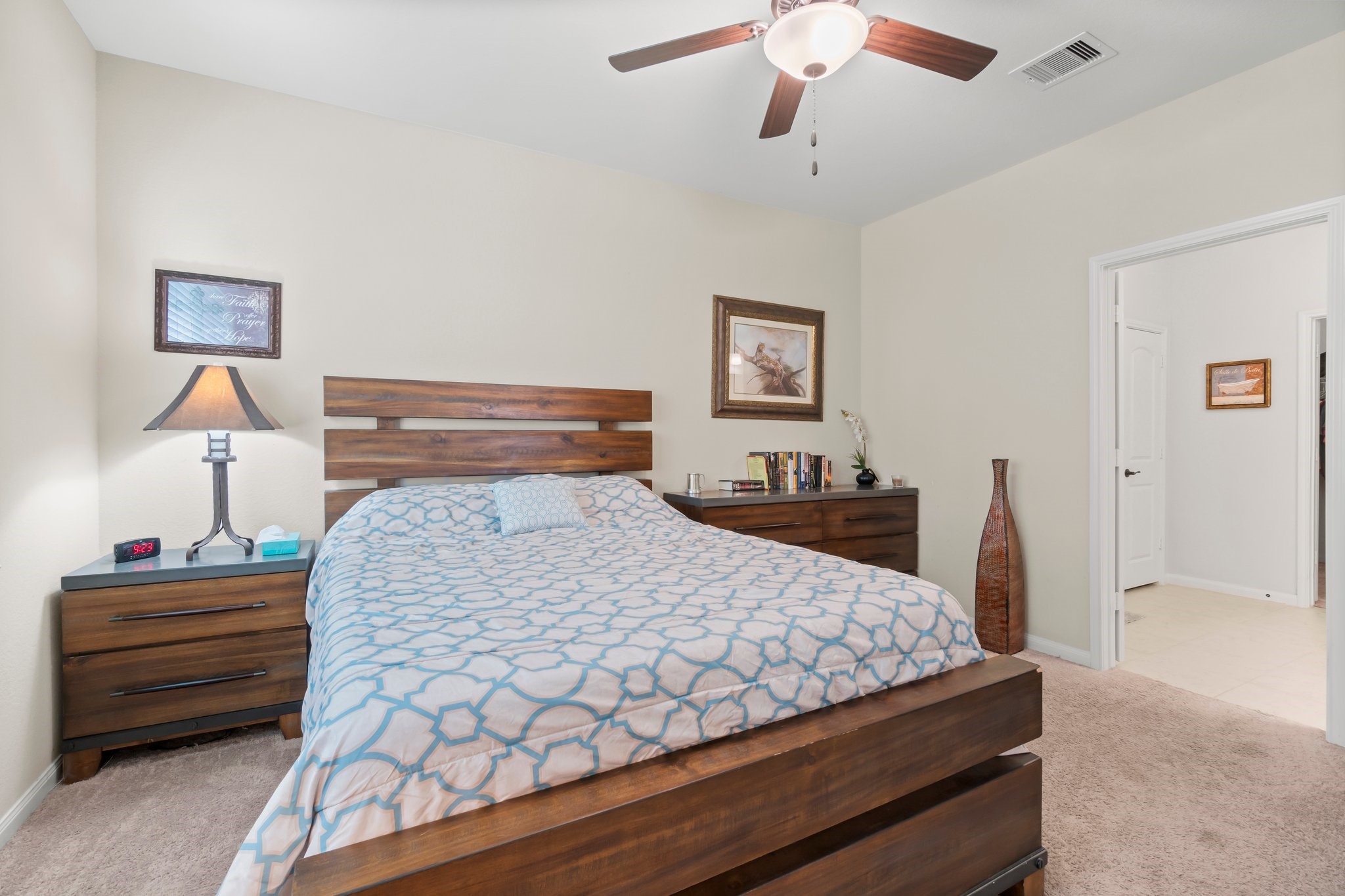 7643 Glaber Leaf Road Conroe, TX 77304 - Photo 10 of 26 The primary suite is at the back of the home with an amazing view overlooking the greenbelt.