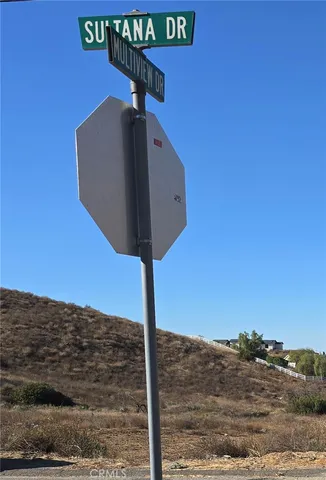 a view of a lake with trees in the background