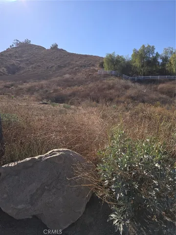 a view of lake with mountain in the background