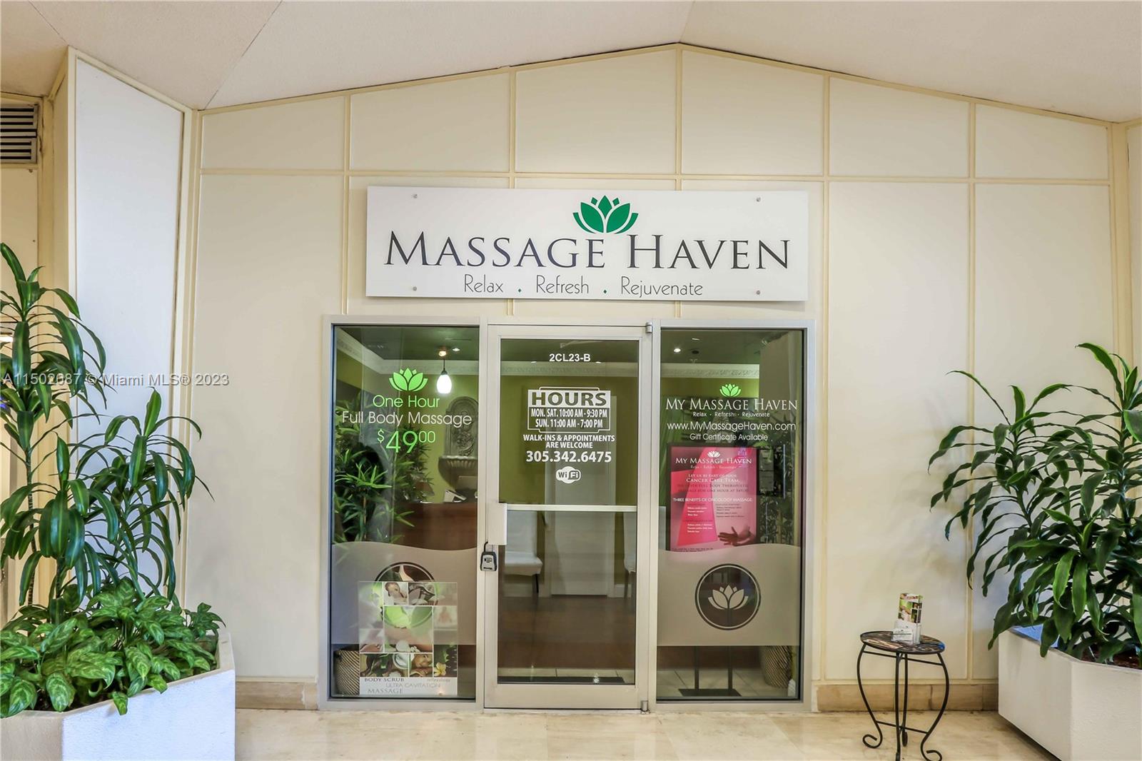 999 Brickell Bay Drive, Unit 1908 Miami, FL 33131 - Photo 21 of 57 a sign on the side of a building