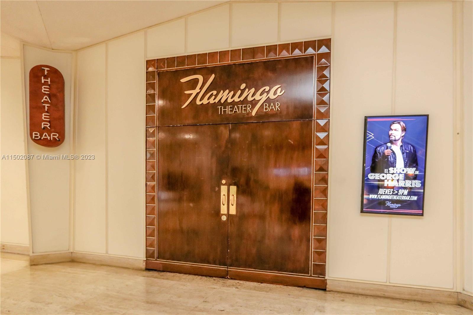 999 Brickell Bay Drive, Unit 1908 Miami, FL 33131 - Photo 7 of 57 a sign on the side of a building