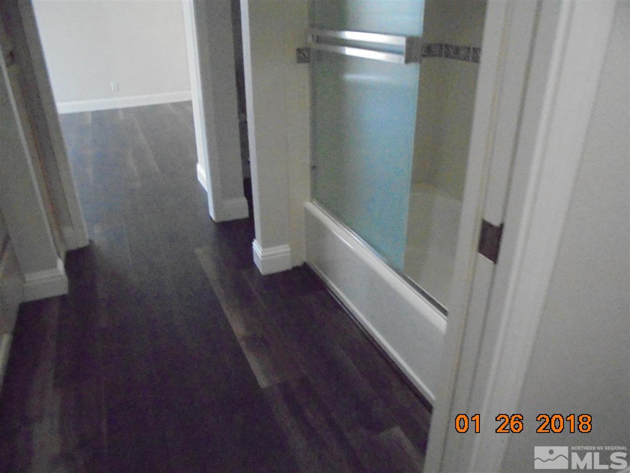 3635 Skyline Boulevard Reno, NV 89509 - Photo 22 of 37 a view of hallway with wooden floor