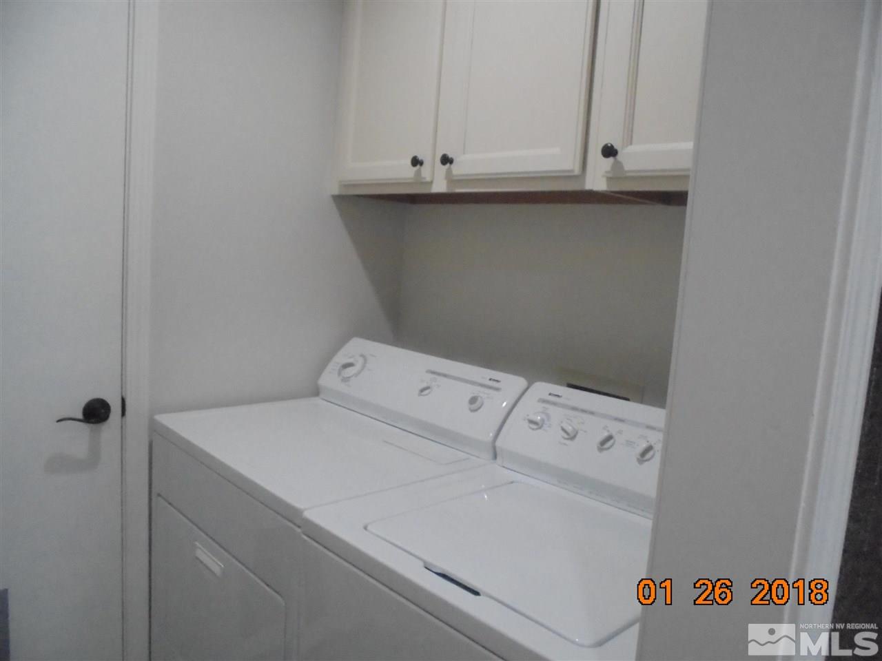 3635 Skyline Boulevard Reno, NV 89509 - Photo 32 of 37 a utility room with dryer and washer