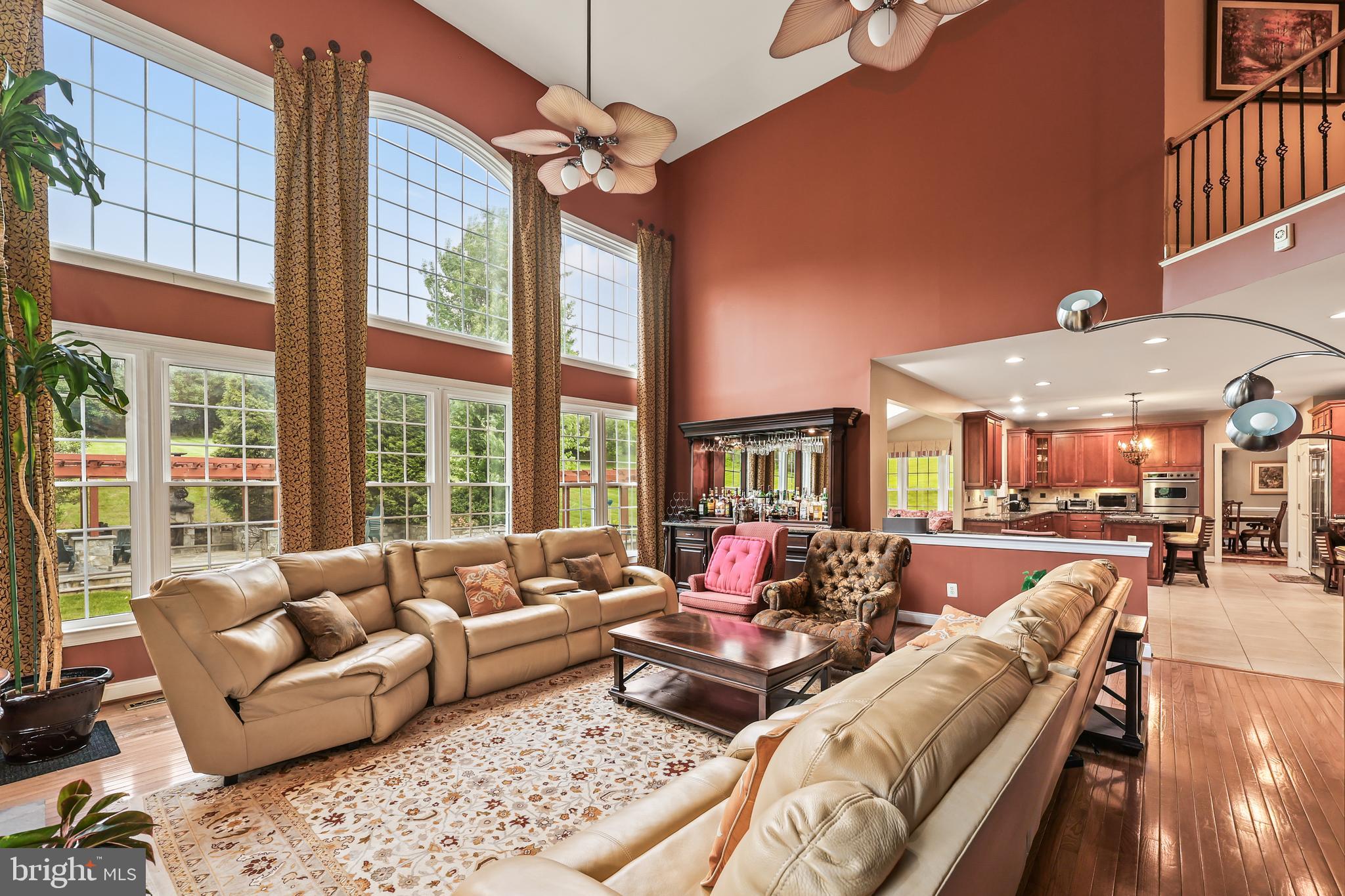 40890 Beechnut Road Leesburg, VA 20175 - Photo 25 of 65 a living room with furniture and a large window