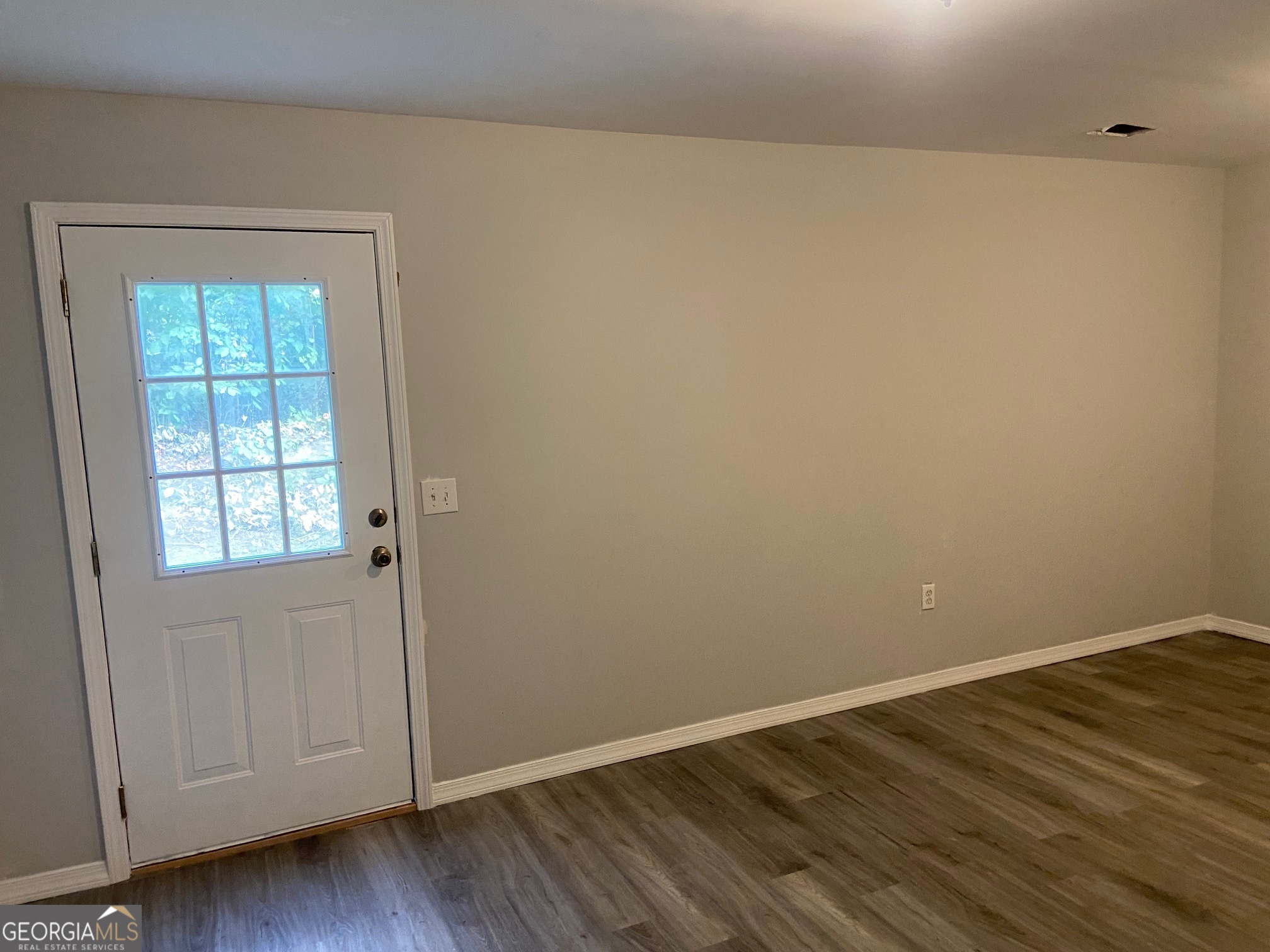 3536 Perry Pointe Austell, GA 30106 - Photo 13 of 32 a view of an empty room with wooden floor