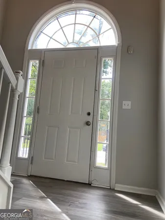 a view of a room with a window