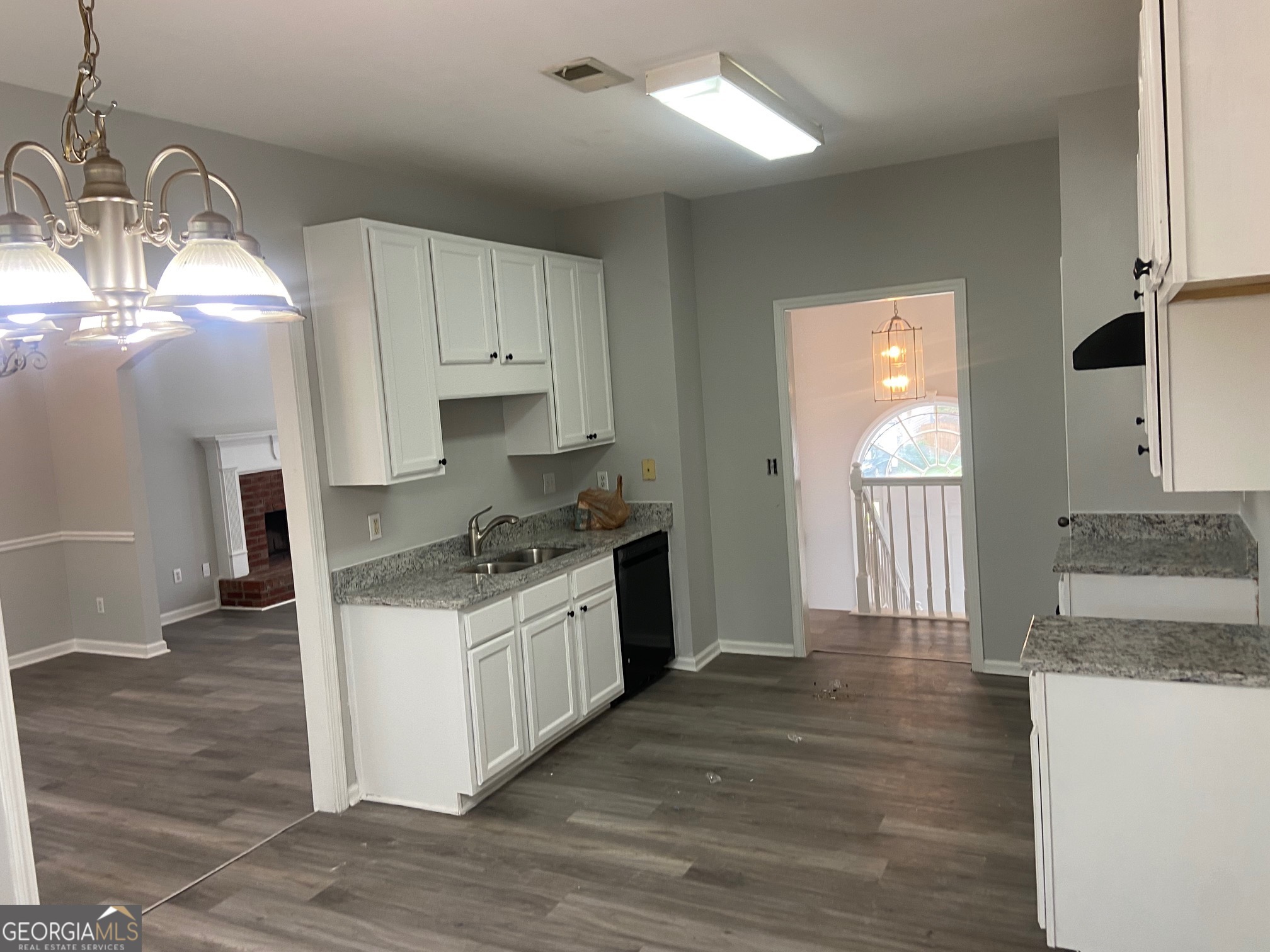 3536 Perry Pointe Austell, GA 30106 - Photo 9 of 32 a kitchen with granite countertop a sink and a stove top oven