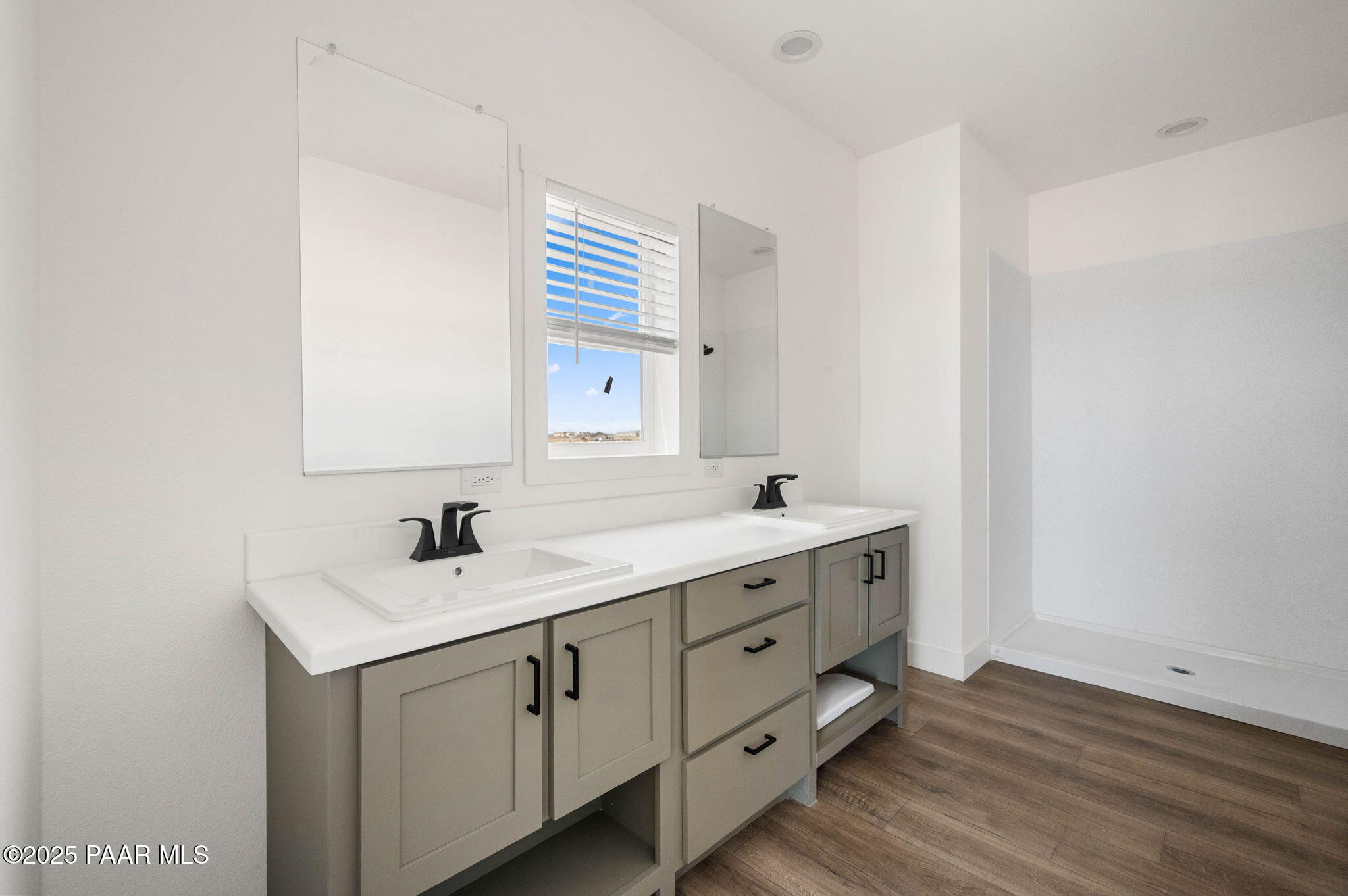 2688 West Altimeter Way Paulden, AZ 86334 - Photo 11 of 22 a bathroom with a sink vanity granite and a mirror