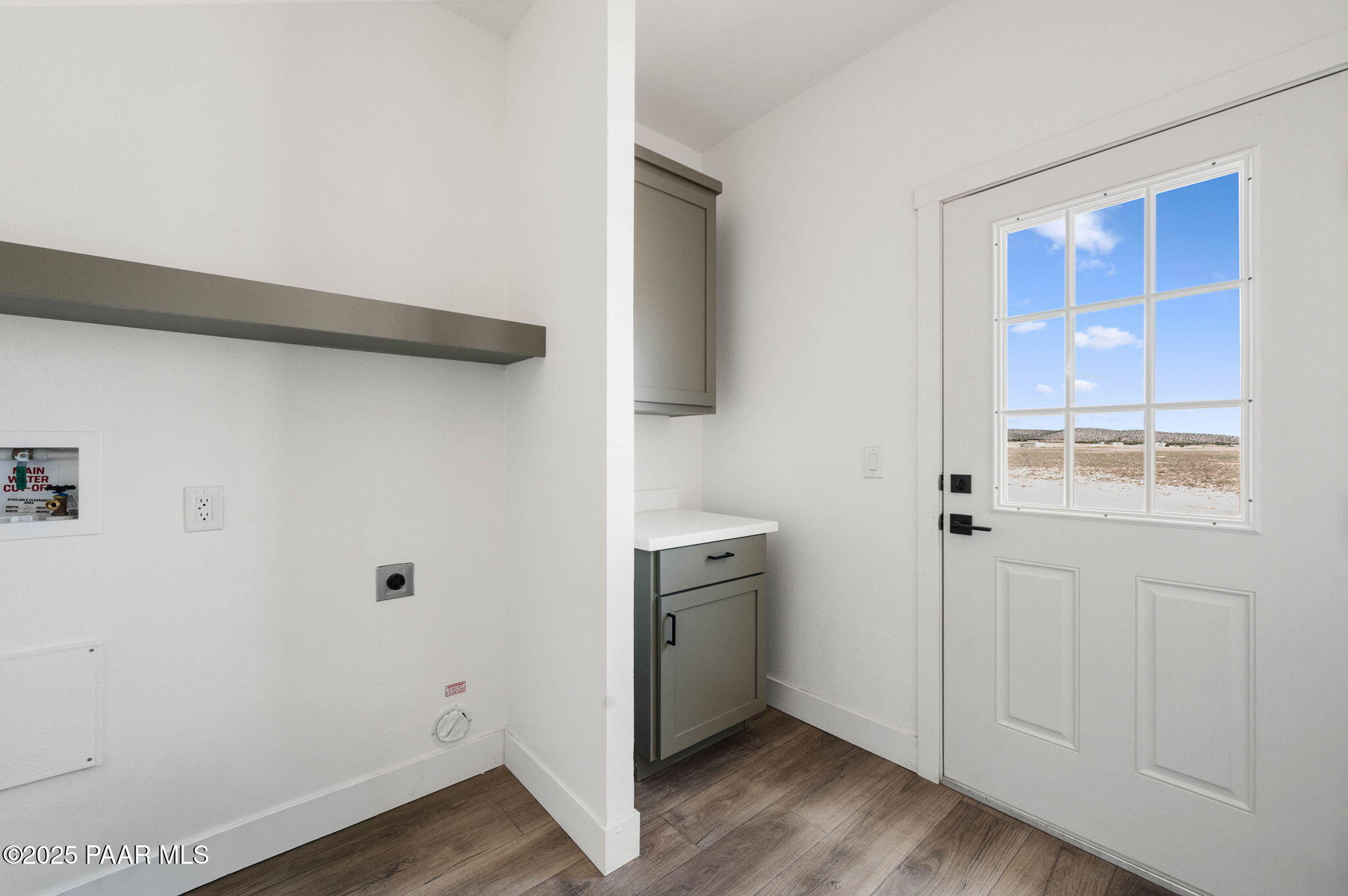 2688 West Altimeter Way Paulden, AZ 86334 - Photo 17 of 22 a view of an empty room with wooden floor and closet