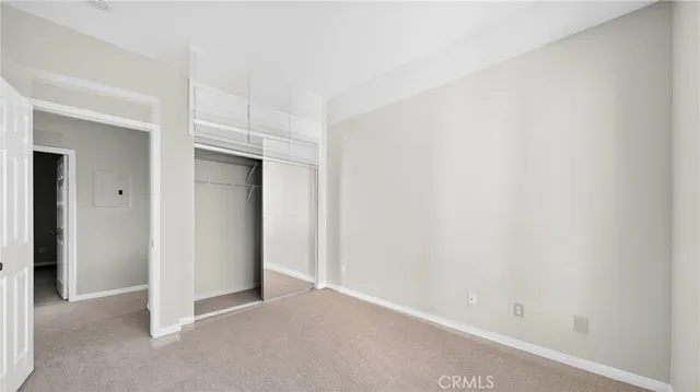 a bathroom with a sink a large mirror and a bathtub