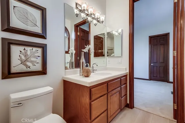 a view of a city with lush green forest