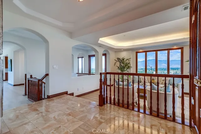 a living room with furniture and windows