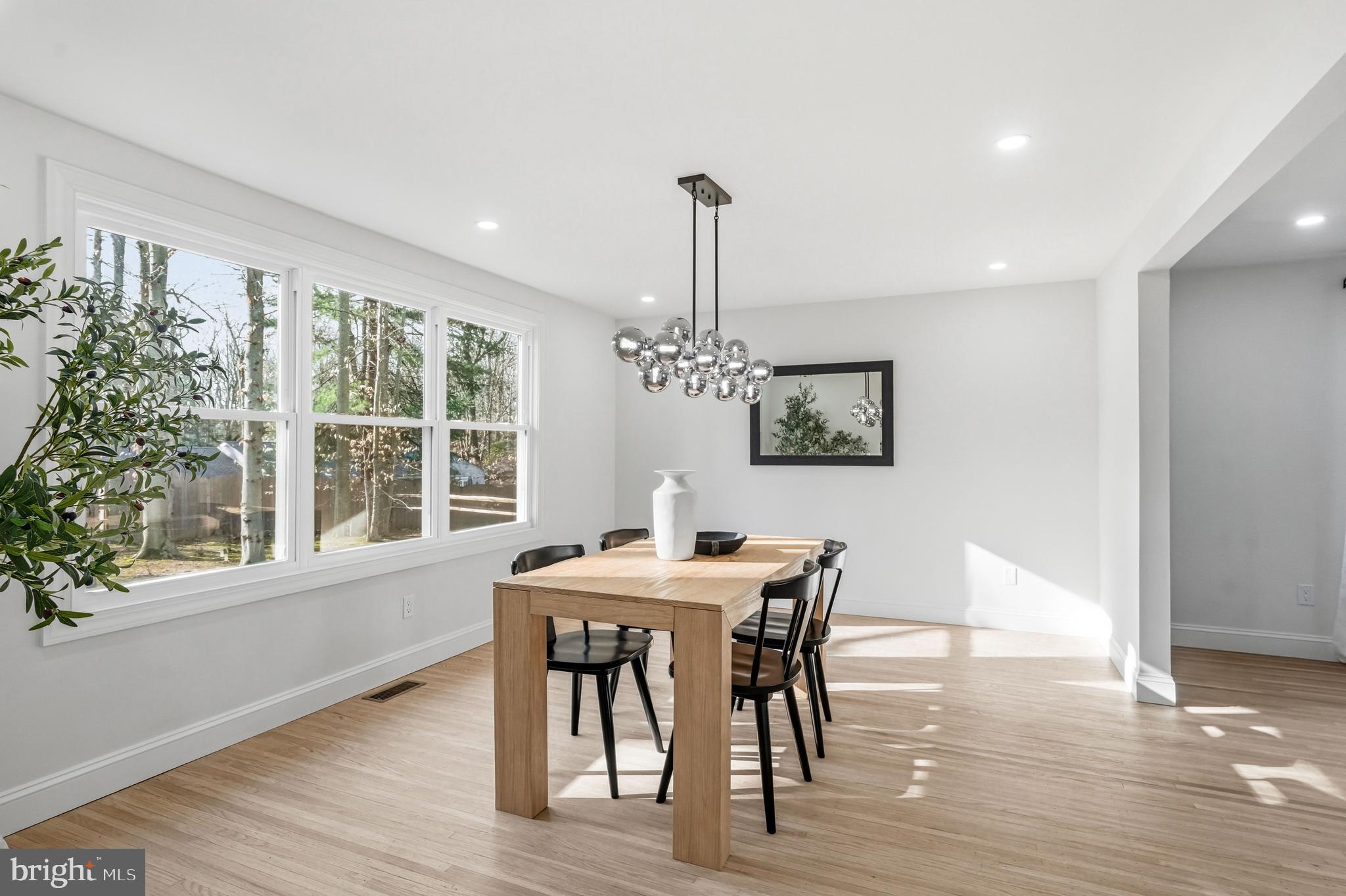 1309 Marlkress Road Cherry Hill, NJ 08003 - Photo 13 of 57 a view of a dining room with furniture window and wooden floor