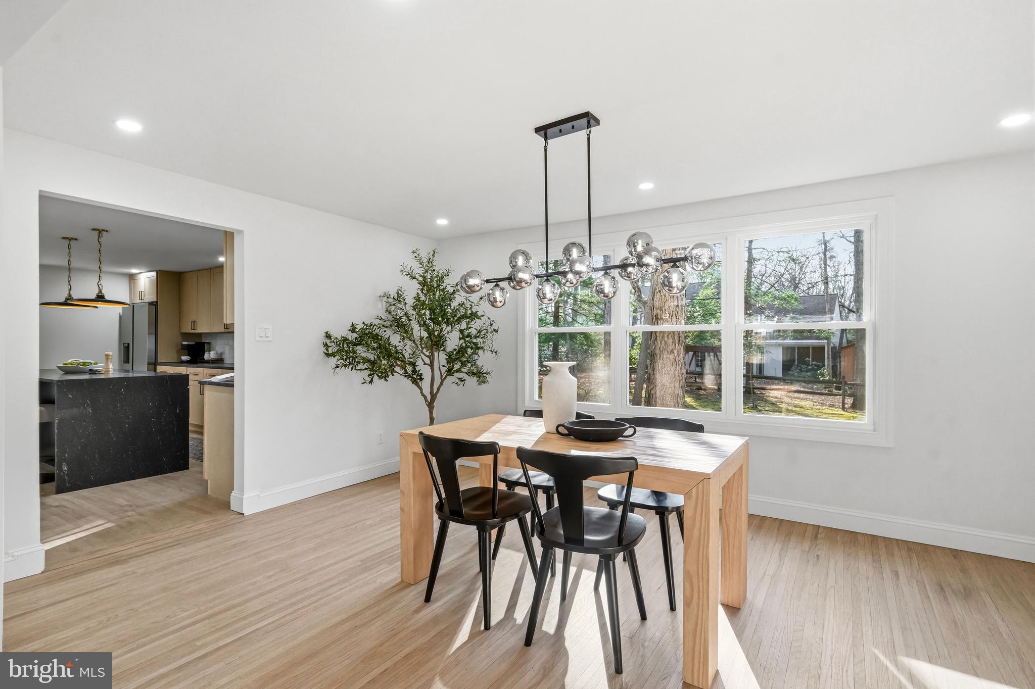 1309 Marlkress Road Cherry Hill, NJ 08003 - Photo 14 of 57 a view of a dining room with furniture window and wooden floor