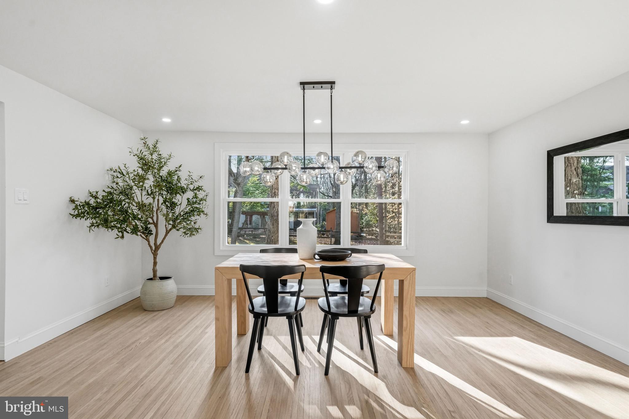 1309 Marlkress Road Cherry Hill, NJ 08003 - Photo 15 of 57 a view of a dining room with furniture window and wooden floor
