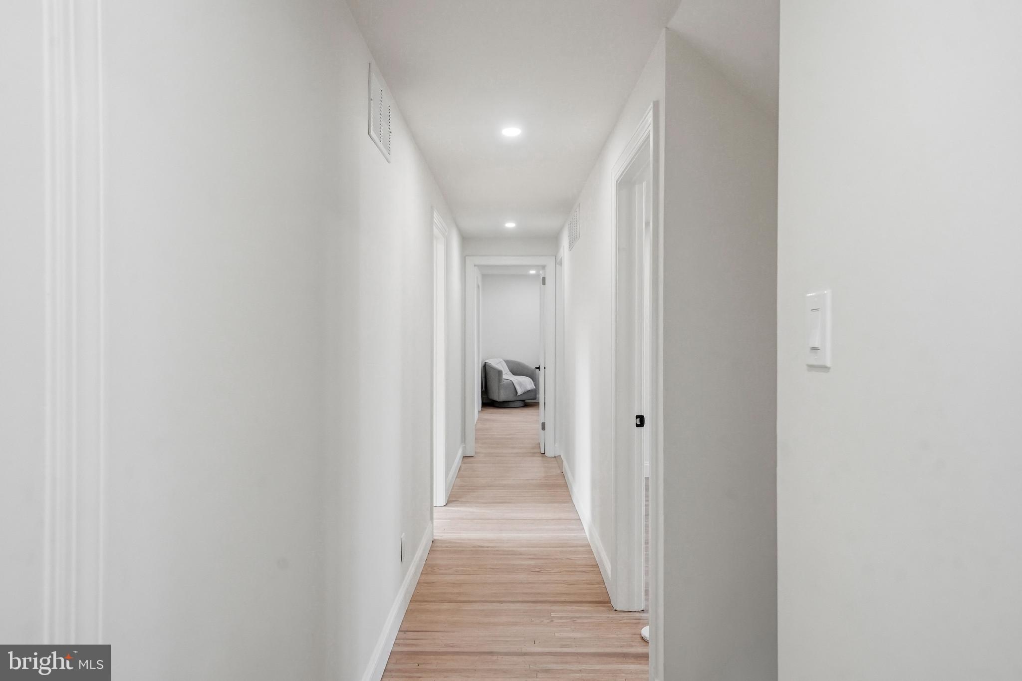 1309 Marlkress Road Cherry Hill, NJ 08003 - Photo 30 of 57 a view of a hallway with wooden floor
