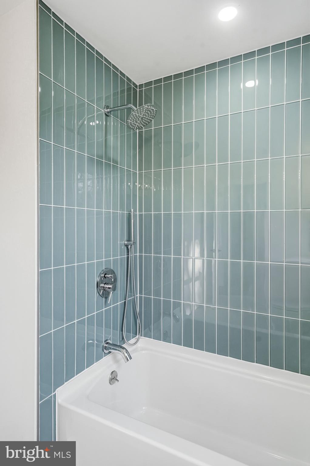 1309 Marlkress Road Cherry Hill, NJ 08003 - Photo 36 of 57 a bathroom with a bathtub and a shower