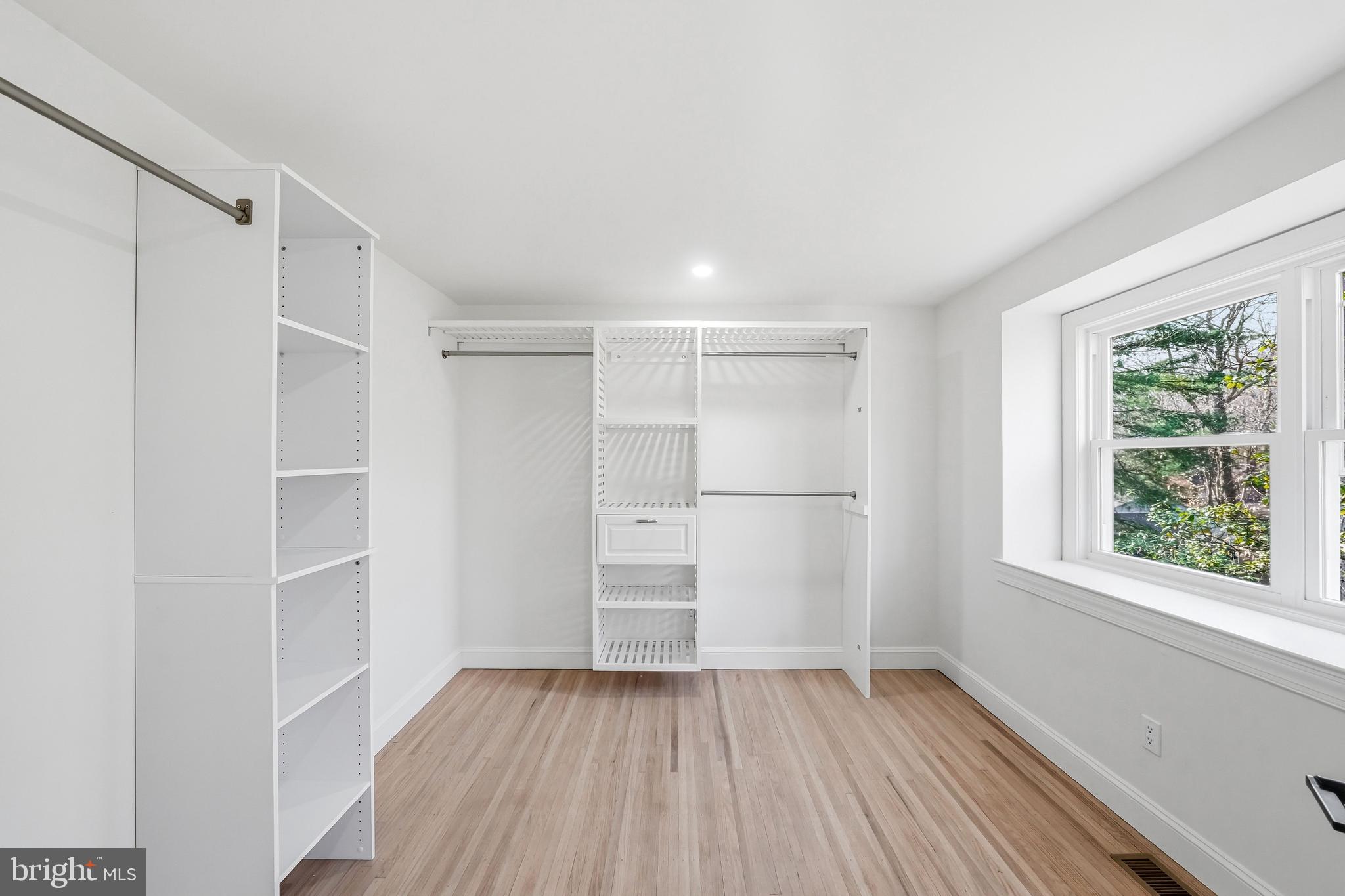 1309 Marlkress Road Cherry Hill, NJ 08003 - Photo 48 of 57 a view of empty room with wooden floor and fan
