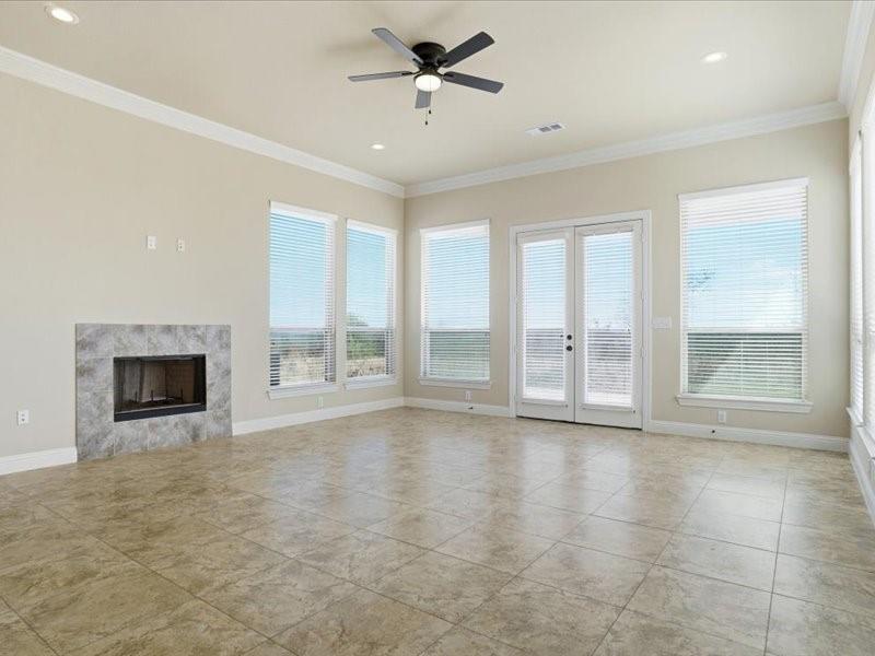 4021 West J E Woody Road Springtown, TX 76082 - Photo 6 of 37 Living area with walls of windows