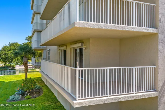 a view of a swimming pool with a garden