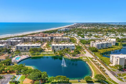 a view of a city with an ocean