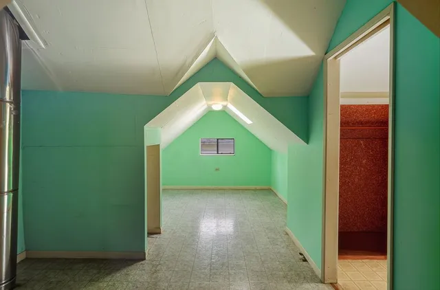 a view of an entryway door with a staircase