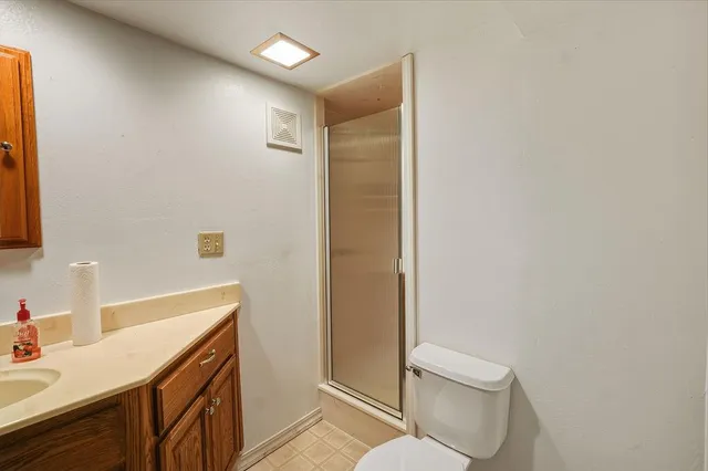 an empty room with wooden walls