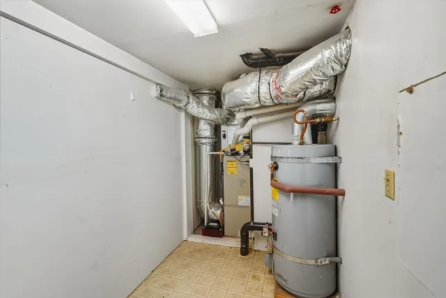 a view of living room kitchen and entryway