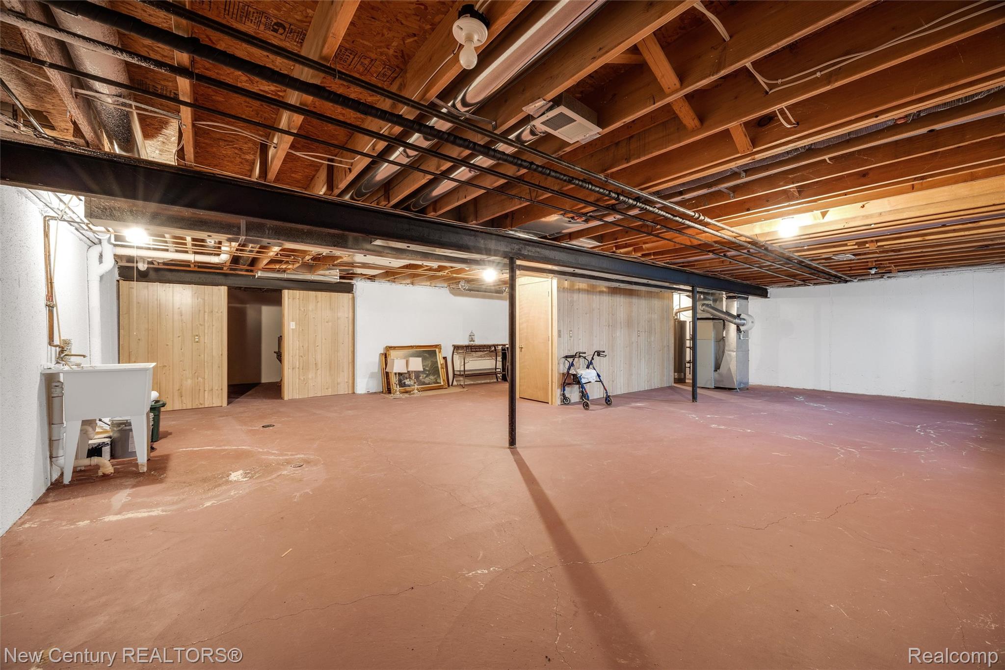 26013 Ranger Avenue Warren, MI 48091 - Photo 18 of 25 Unfinished basement with heating unit and a sink